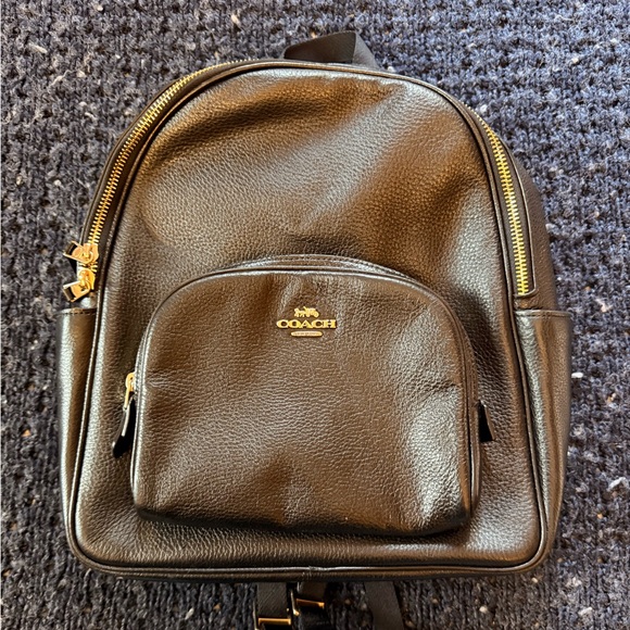 Coach Handbags - Coach Black Leather Backpack with Gold Details
